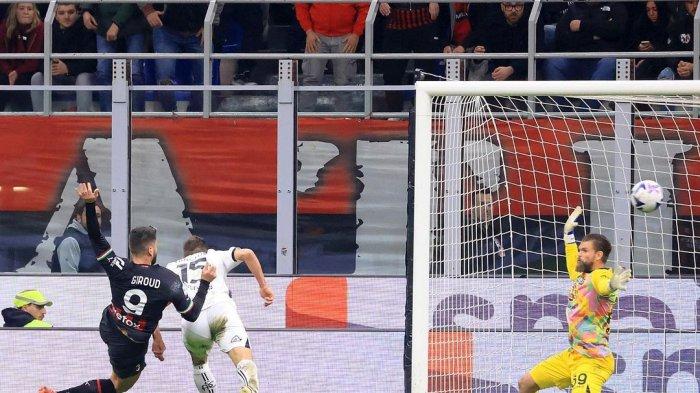 Olivier Giroud saat mencetak gol di laga AC Milan vs Spezia