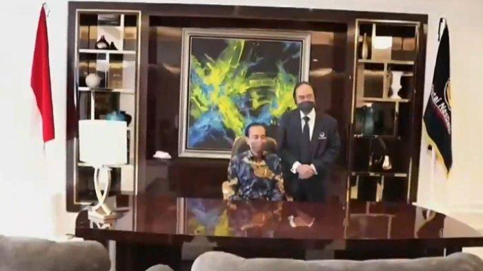 Presiden Joko Widodo (Jokowi) duduk di kursi Ketua Umum Partai Nasdem Surya Paloh saat peresmian Nasdem Tower, Selasa (22/2/2022).