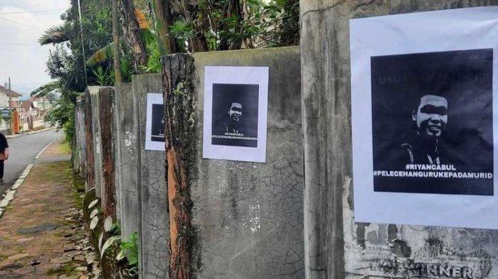 Poster bertuliskan #riyancabul disertai foto wajah terpasang di tembok-tembok pagar tidak jauh dari Madrasah Aliyah di Magelang, Jawa Tengah, Jumat (1/7/2022).