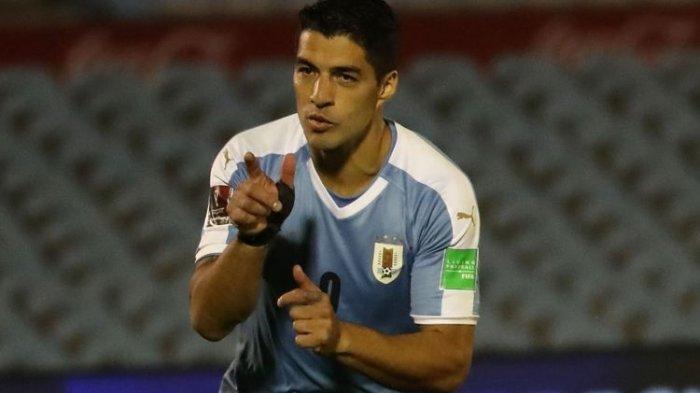 Luis Suarez merayakan golnya pada laga Kualifikasi Piala Dunia 2022 zona CONMEBOL yang mempertemukan Uruguay vs Chile, Jumat (9/10/2020) pagi WIB.(AFP/ RAUL MARTINEZ)
