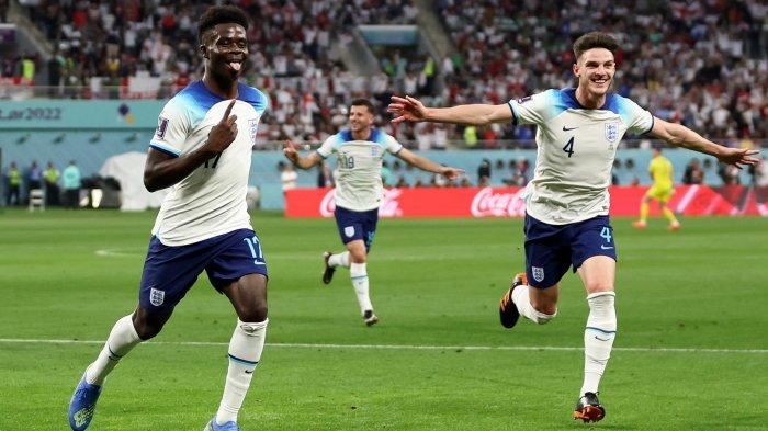 Selebrasi penyerang Inggris, Bukayo Saka seusai mencetak gol ke gawang Iran pada laga perdana Grup B Piala Dunia 2022 di Stadion Internasional Khalifa, Senin (21/11/2022).