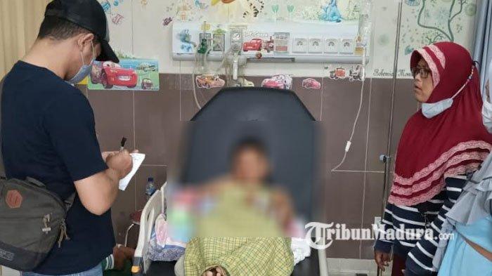 DAM bocah berusia 9 tahun yang tangan kanannya terluka dirawat di RS SLG Kabupaten Kediri, Minggu (24/4/2022).