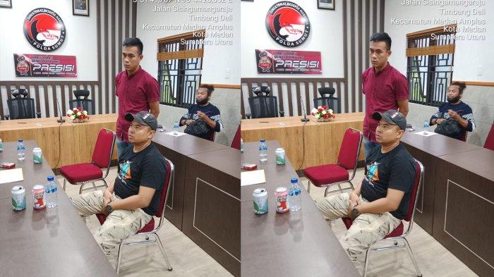 Pratu Rian Herman (kiri) dan Sertu Yalpin Tarzun (kanan) saat menjalankan pemeriksaan di Polda Sumut.