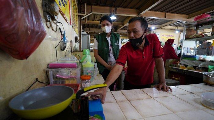 Penggunaan kompor induksi di dapur rumah tangga