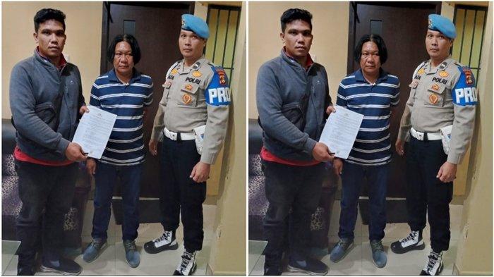 Aipda Safrudin (tengah) oknum polisi pemilik gudang BBM terbakar di Keramasan Kertapati Palembang