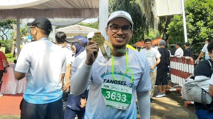 Wakil Wali Kota Tangerang Selatan Pilar Saga Ichsan menyelesaikan lari 10 kilometer dalam tempo 1 jam 27 menit dalam Tangsel Marathon, di Kota Tangsel, minggu (11/9/2022).