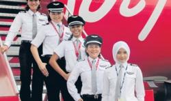 Ya Allah, Cantiknya Pilot Perempuan Berhijab Ini