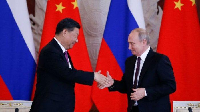 Presiden China, Xi Jinping dan Presiden Rusia, Vladimir Putin.